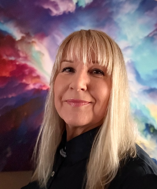 Portrait of holistic therapist, Vanessa, in Cardiff providing reflexology and reiki